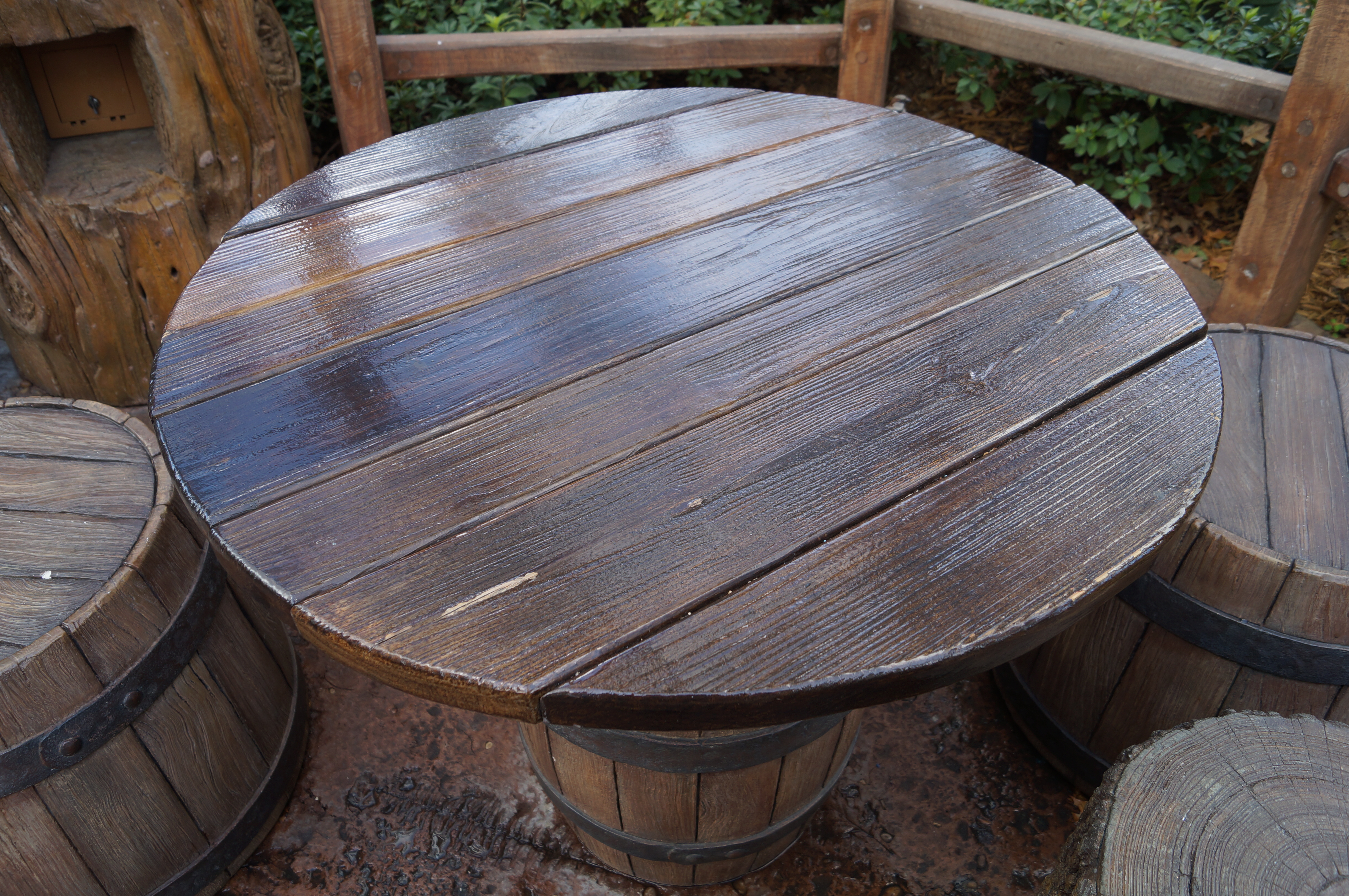 Fantasyland wood tables Disney World coating