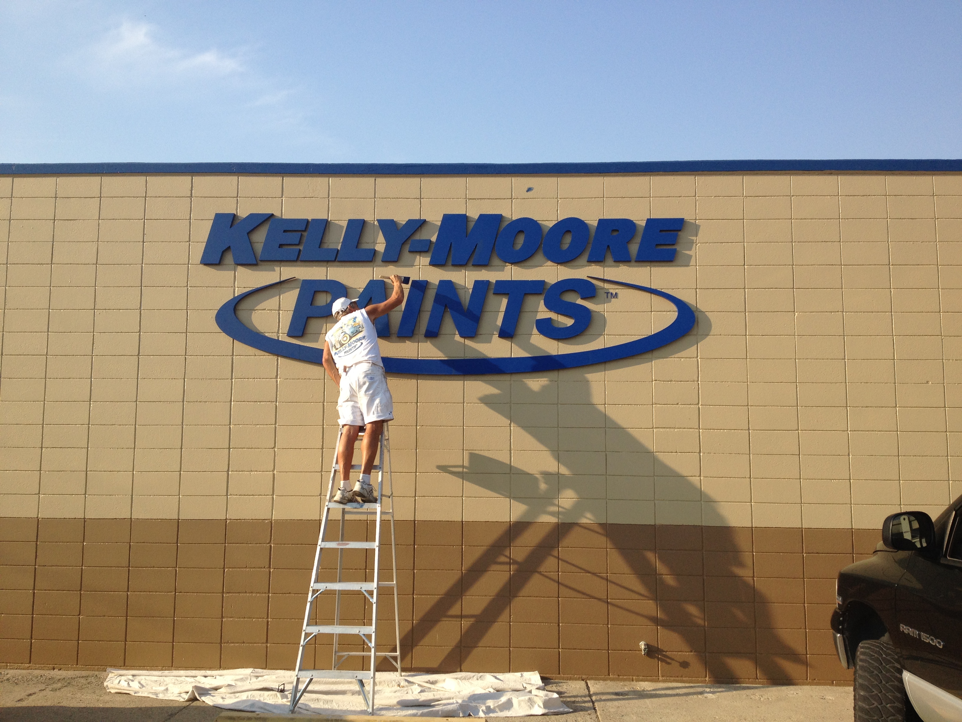 Kelly Moore paint store sign metal coating