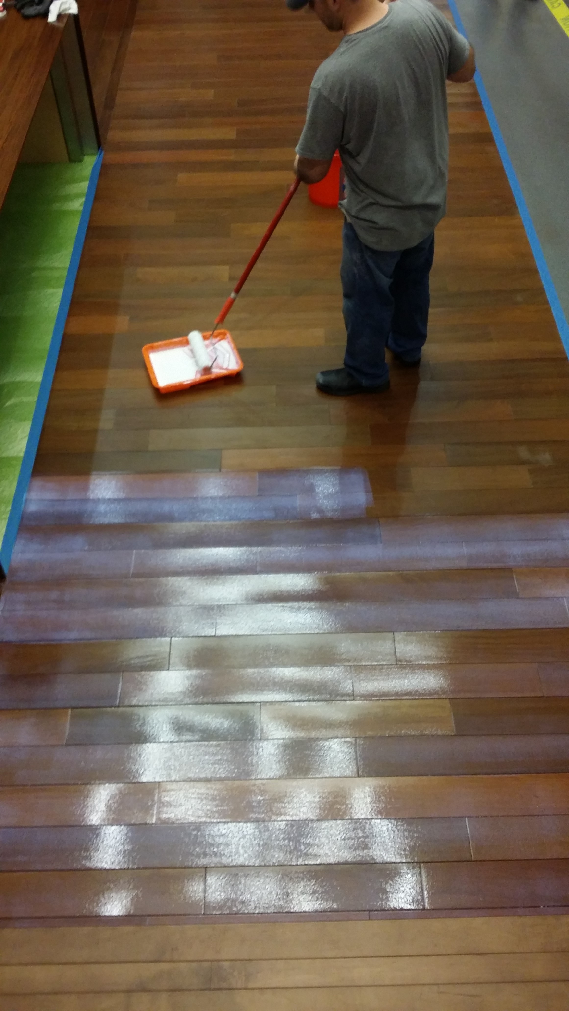 SX Satin Clear being applied to wood surfaces at Kraft Heinz facility